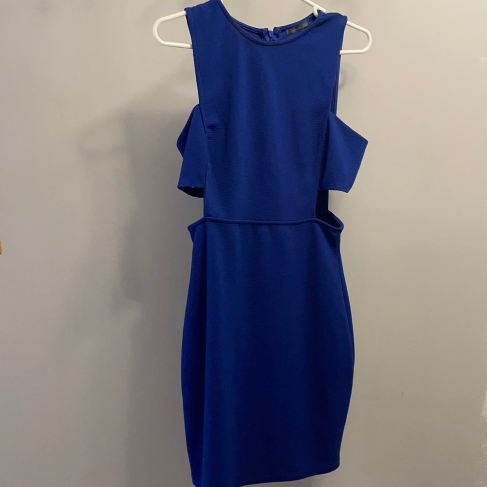 Blue cut out dress . Size large fits like a medium. Worn once .